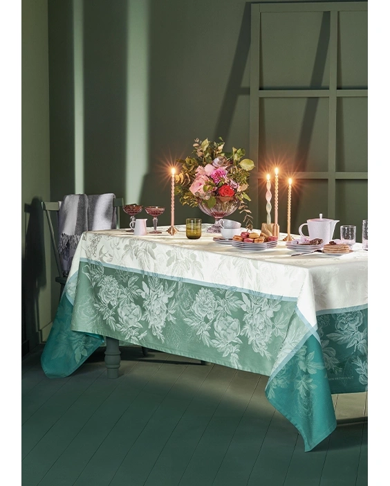 Save 60% on the Jardin De Pivoines Vert Tablecloth—stain-resistant cotton with beautiful floral designs.