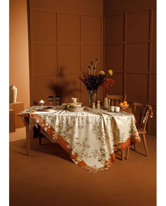 Bring autumn vibes to your table with the cotton-linen blend Mandarines Rouille Tablecloth at 50% off.