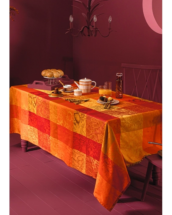 Save 60% on the Mille Senteurs Epices Tablecloth, featuring bold pomegranates in vibrant colors.